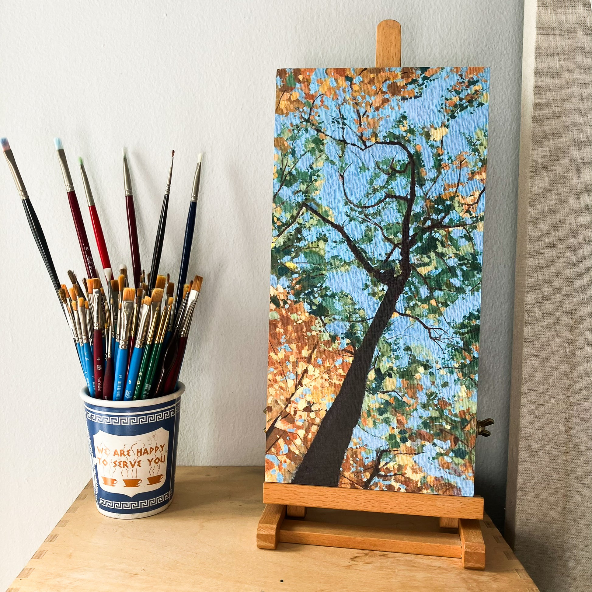 Original landscape painting by Gregory Stulting of a colorful fall tree.